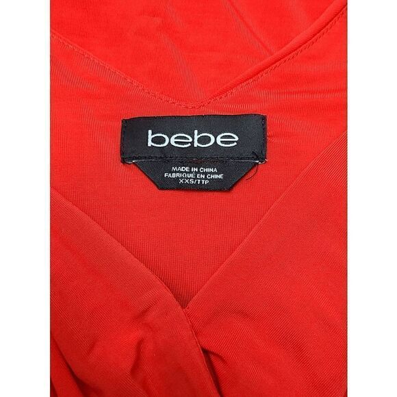 🧡 BEBE Twist Skirt Asymmetrical Hem Grecian Goddess Orange Dress Size XXS/TTP - Picture 6 of 12